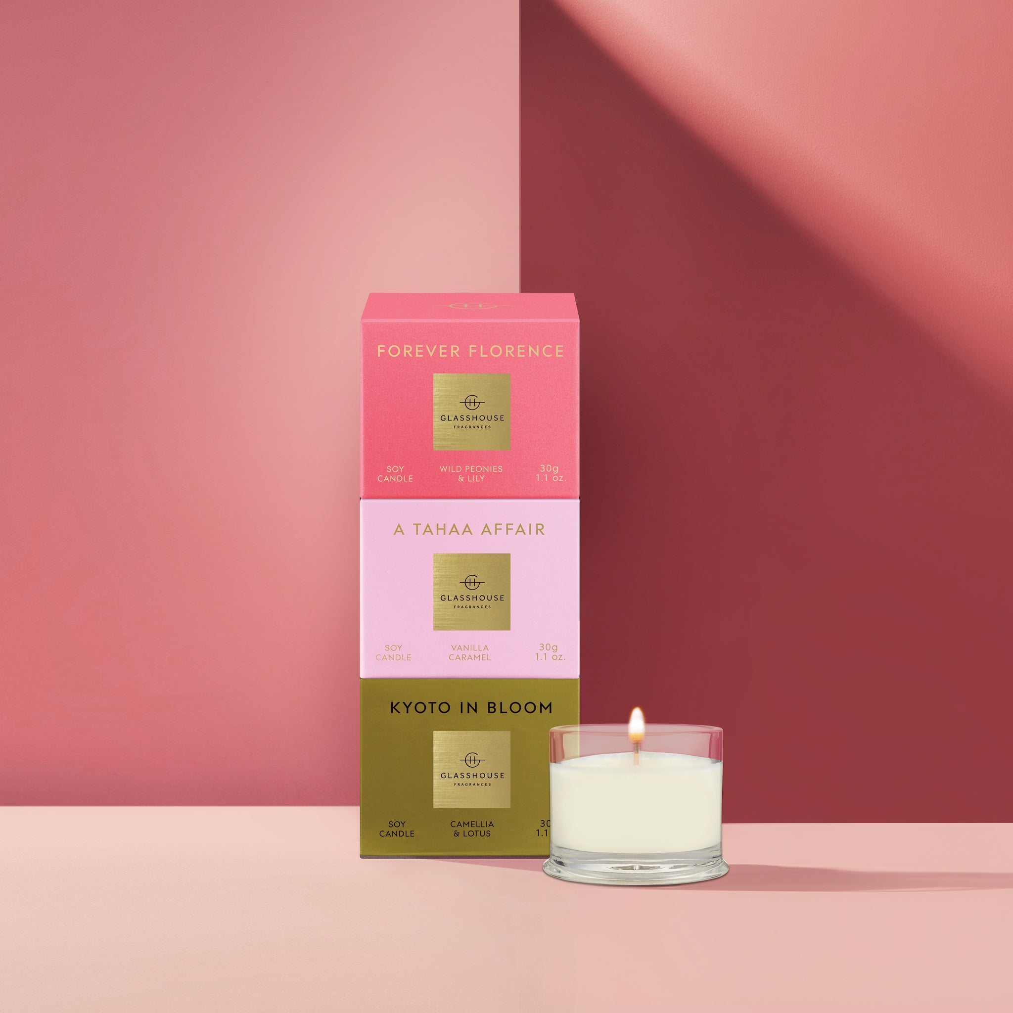 Burning 30g Candle next to packaging